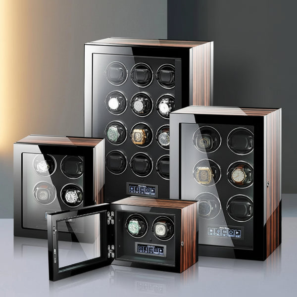 Luxury watch winders with glass doors and wood accents displaying multiple watches.