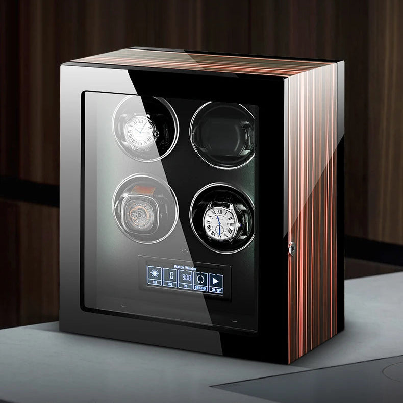 Luxury four-slot watch winder with glass door and wood grain finish on modern table